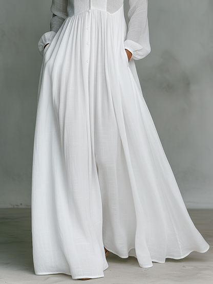 Sita | Maxi robe en patchwork, col montant et manches longues